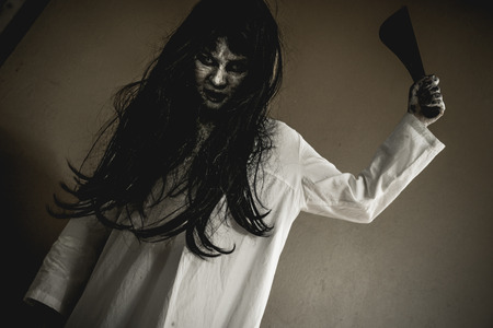 Halloween or horror concept, Women dressed in costume cosplay horror zombies or ghost on Halloween festival.の写真素材
