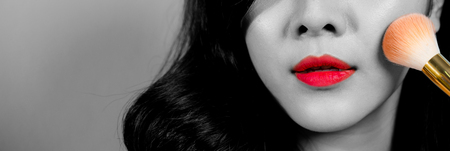 Beauty and cosmetic concept. Beauty Asian woman and makeup brush. Natural makeup with beautiful v shape face and black short hair style.の写真素材