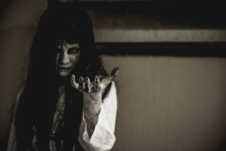 Halloween or horror concept, Women dressed in costume cosplay horror zombies or ghost on Halloween festival.の写真素材