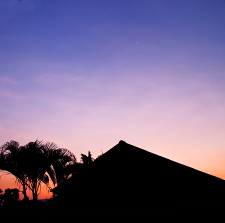 House silhouette with  sunset sky background の写真素材