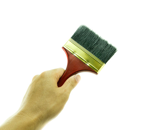 Hand and Paint brush on  white backgroundの写真素材