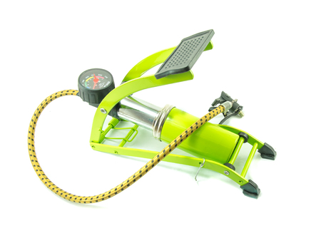 Green foot air pump on white backgroundの写真素材