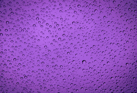 water drop on glass backgroundの写真素材