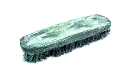 Old clothes brush on white background,  old wooden clothes brushの写真素材