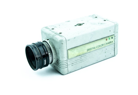 Old cctv camera on white background, analog camera