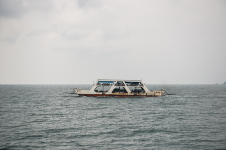 KOH CHANG ISLAND, THAILAND - MARCH 20, 2015 - View of port ferry boat in Koh Chang Island, Trat, ,Thailand. Ferry services will take vehicles and passengers from the mainland to Koh Chang.のeditorial素材