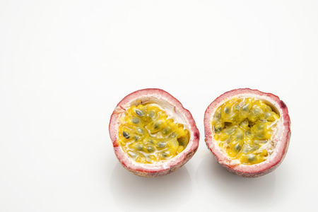 Juicy cut passion fruit isolatedの写真素材