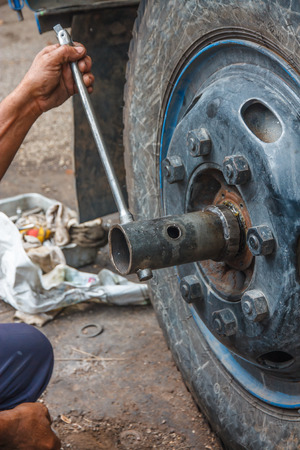 Car wheel changed by mechanicの写真素材
