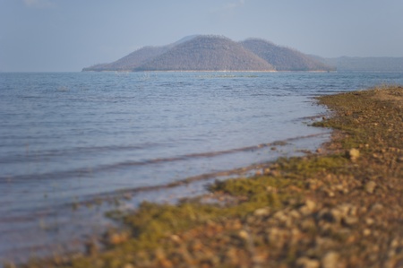 Mountain on the dam from kanjanaburi province of thailandの写真素材