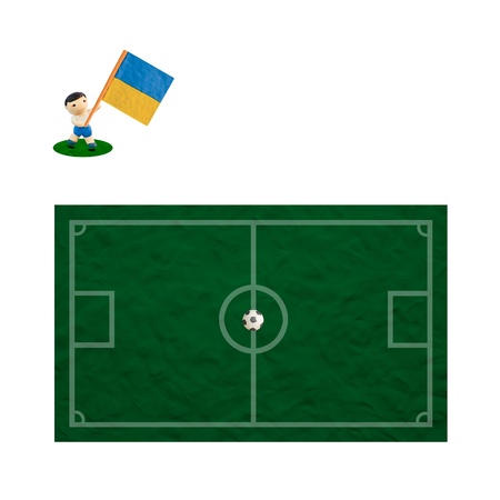 Plasticine Football with the flag on grass and  board backgroundの写真素材