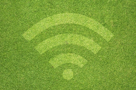 Wireless icon on green grass texture and  backgroundの写真素材
