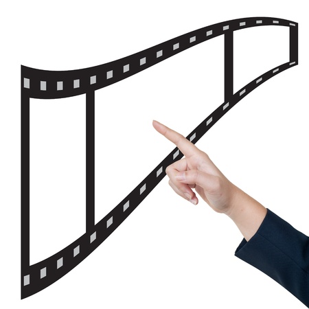 Hand pushing film button on a touch screen interface の写真素材
