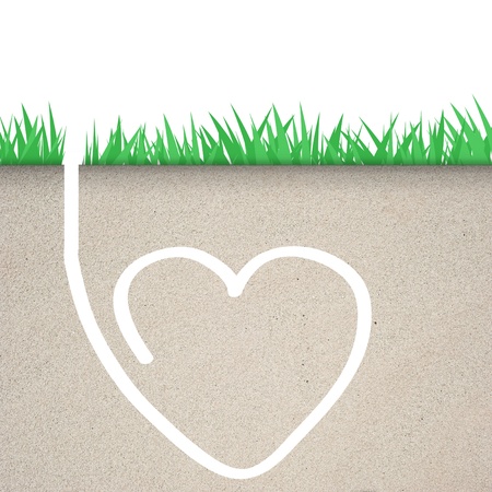 Green grass with heart icon in soil の写真素材