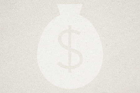 Money icon on sand background and textured の写真素材