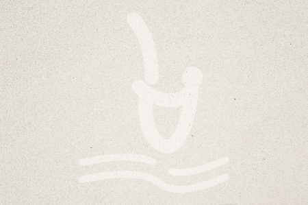 Swim icon on sand background and textured の写真素材