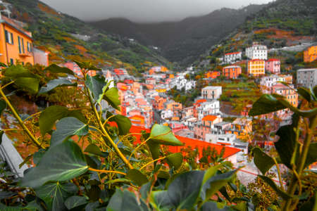 Riomaggiore, Liguria Italy. Traditional typical Italian village in National park Cinque Terre, colorful multicolored buildings houses on mountainの写真素材