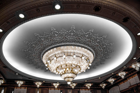 Bucharest, Romania - 10 12 2018 Chrystal chandelier lamp of parliament palace Bucharest. Decorative elegant vintage and Contemporary interior Conceptのeditorial素材