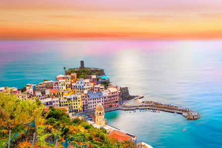 Colorful sunset on Vernazza in cinque terre on the mountain near mediterranean sea in liguria -...