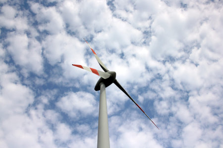 one power wind mills against the sky