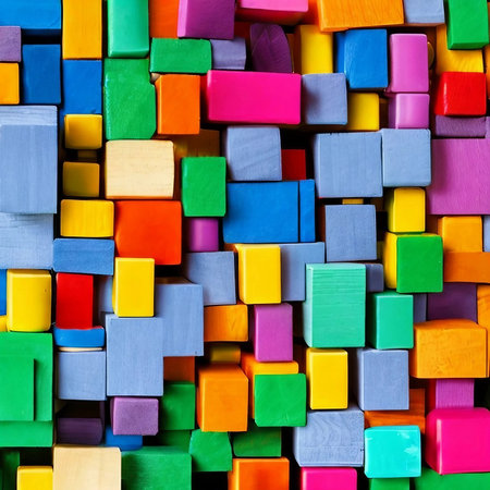Colorful wooden building blocks background. Close up of colorful wooden building blocks.の素材