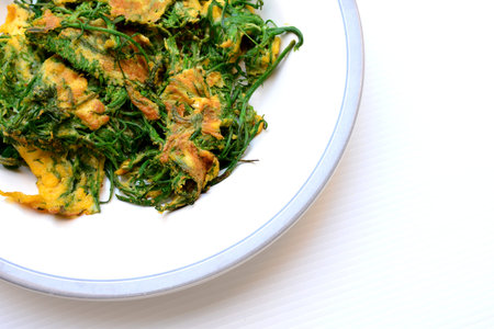 Cha-om Omelet in white plate(Acacia Pennata Omelet); Thai traditional foodの写真素材