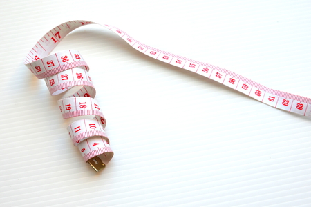 Measuring tape for control your waistの写真素材