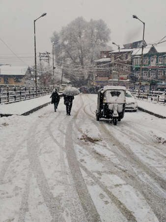 normal life paralyzed by heavy snowfall in srinagar kashmirの写真素材