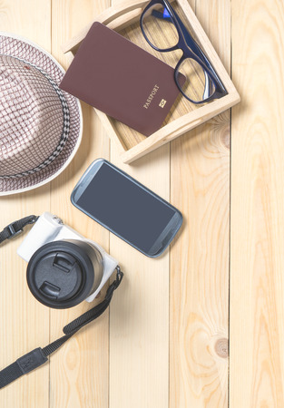 Explorer travel collection with copy space on wooden background.の写真素材