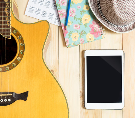 Blank Tablet with Guitar instrument for Music Contentsの写真素材