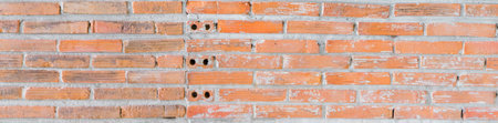 Orange rustic brick wall for banner background.