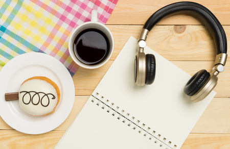Music and Writing relaxation in Cafe with copy space notebookの写真素材