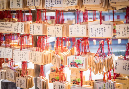 Fukuoka, Japan - March 19, 2016: Fukuoka on March 19, 2016. People are hanging the fortune wooden tags for good luck.のeditorial素材