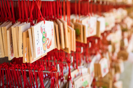 Fukuoka, Japan - March 19, 2016: Fukuoka on March 19, 2016. People are hanging the fortune wooden...