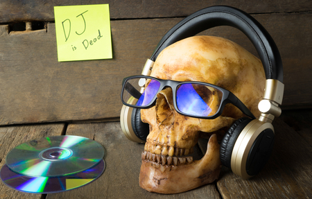 Music DJ is Dead. Ghost is listening to music headphone.の写真素材