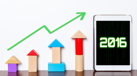 2016 success graph business concept goal setting. Tablet and colorful toy for business and motivation success.のeditorial素材