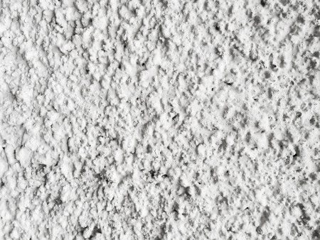 white Concrete wall with hole texture closed upの写真素材