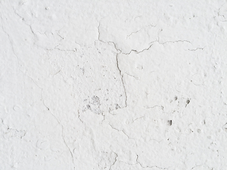 White Cracked concrete cement wall closed up background textureの写真素材