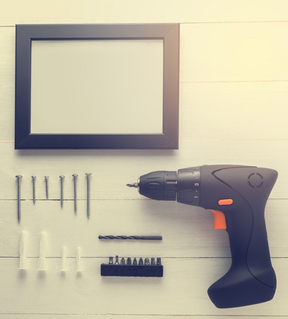 DIY home decoration set with screw driver hammer for picture frame DIY installation. Photo frame installation complete DIY set.の写真素材