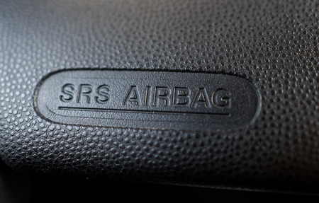 Car Air bag logo on the front seat panelの写真素材