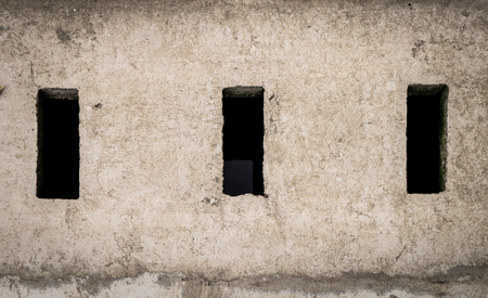 Three sewer holes of a street cement water flow systemの写真素材