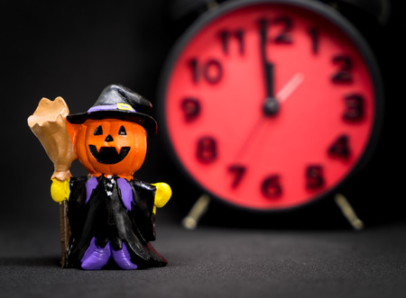 Count down clock pumpkins ghost toy isolatedの写真素材