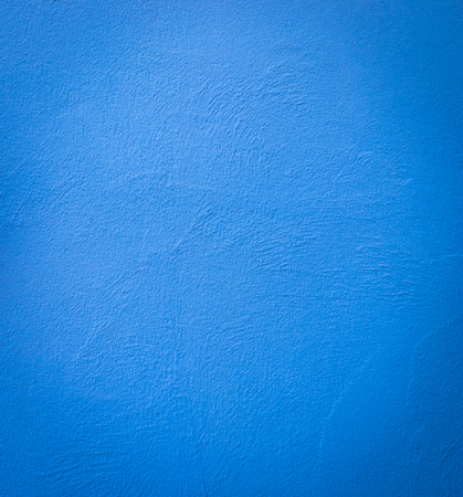 Cement wall painted blue for texture background.の写真素材
