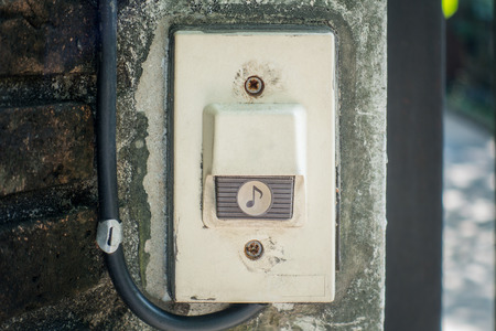 Electric House Gate Buzzer Bell button on concrete wallの写真素材