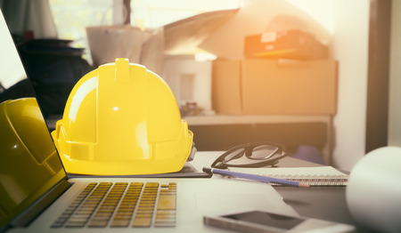 construction protection Hat on an Office tableの写真素材