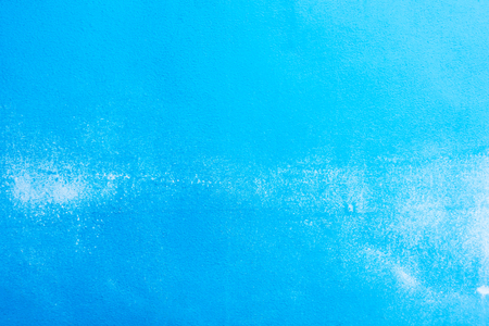 Blue cement background with satined paint textureの写真素材