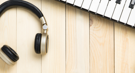 Guitar and piano on wood with copy spaceの写真素材