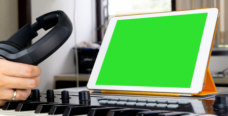 Sound engineer working on tablet music work stationの写真素材