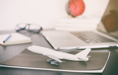 Travel Agency office table with laptopの写真素材