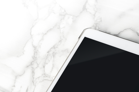 Blank tablet screen on luxury marble deskの写真素材