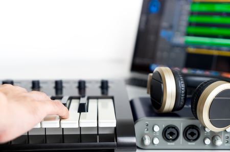 Musician is recording Portable Computer Music Studio home set upの写真素材